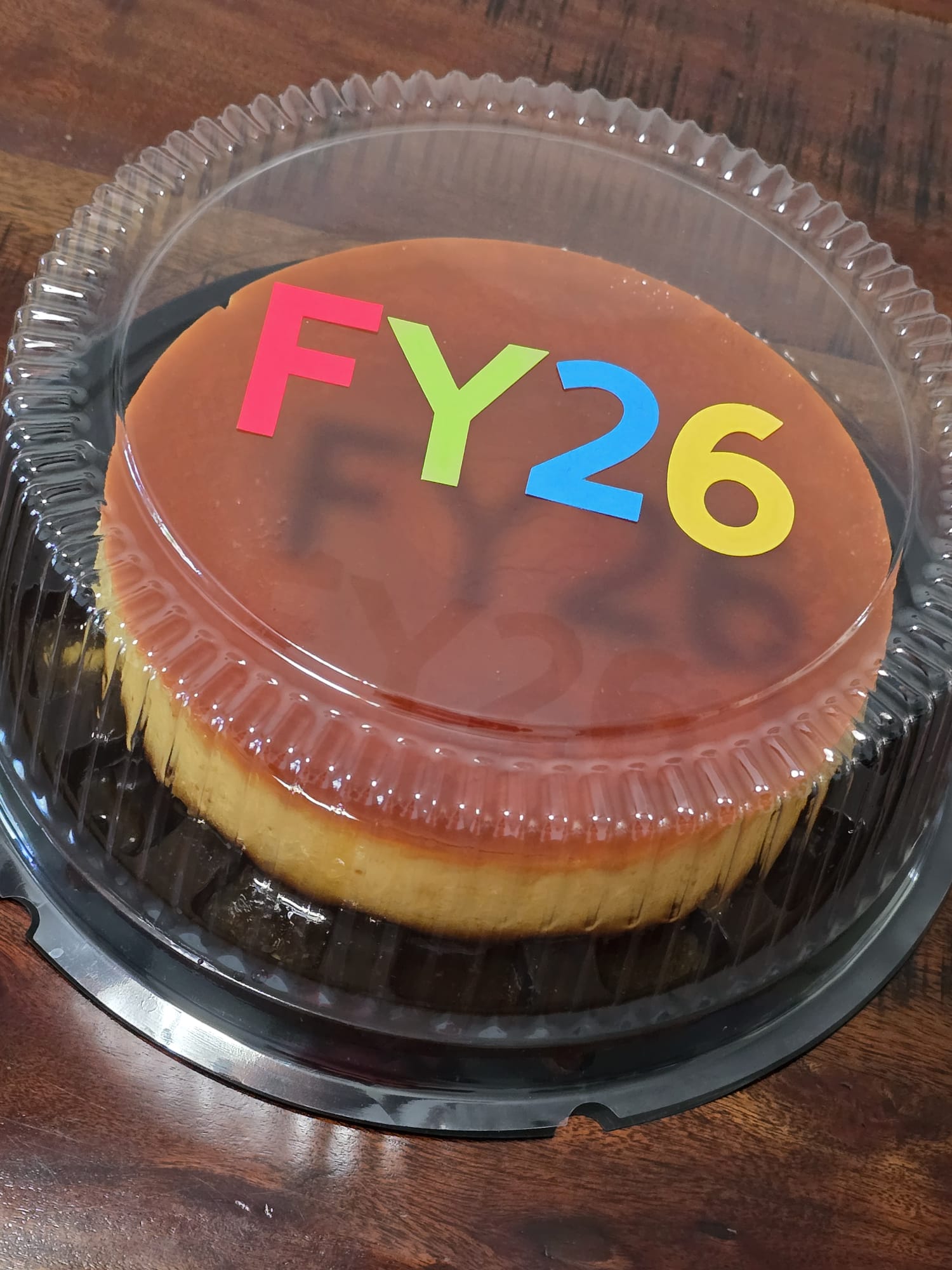 Caramel flan with a colorful custom FY26 top