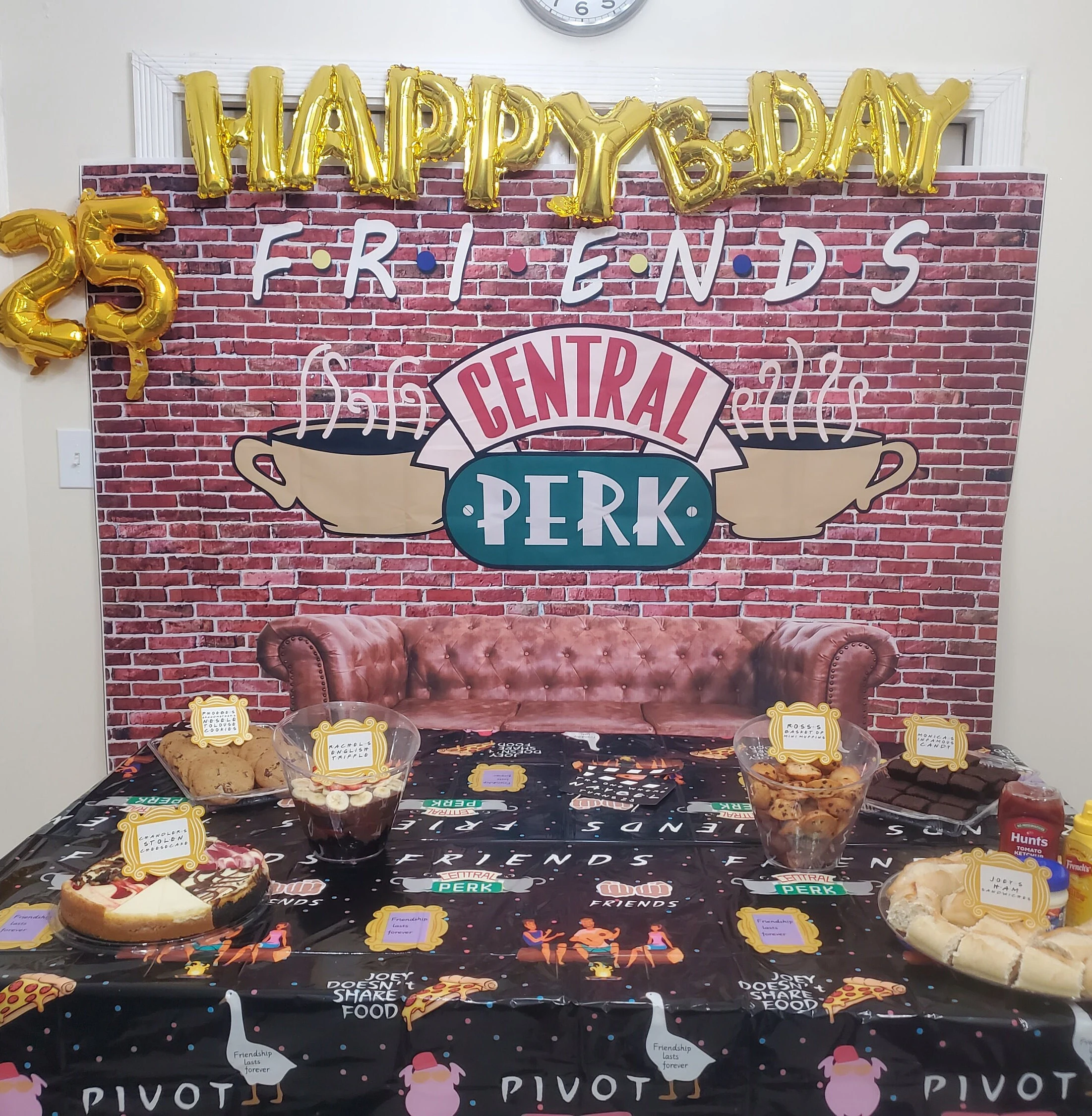 Friends-inspired party table with themed food labels